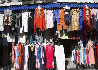 從地攤零售到跨境巨頭 潘永淼的服裝致富之路